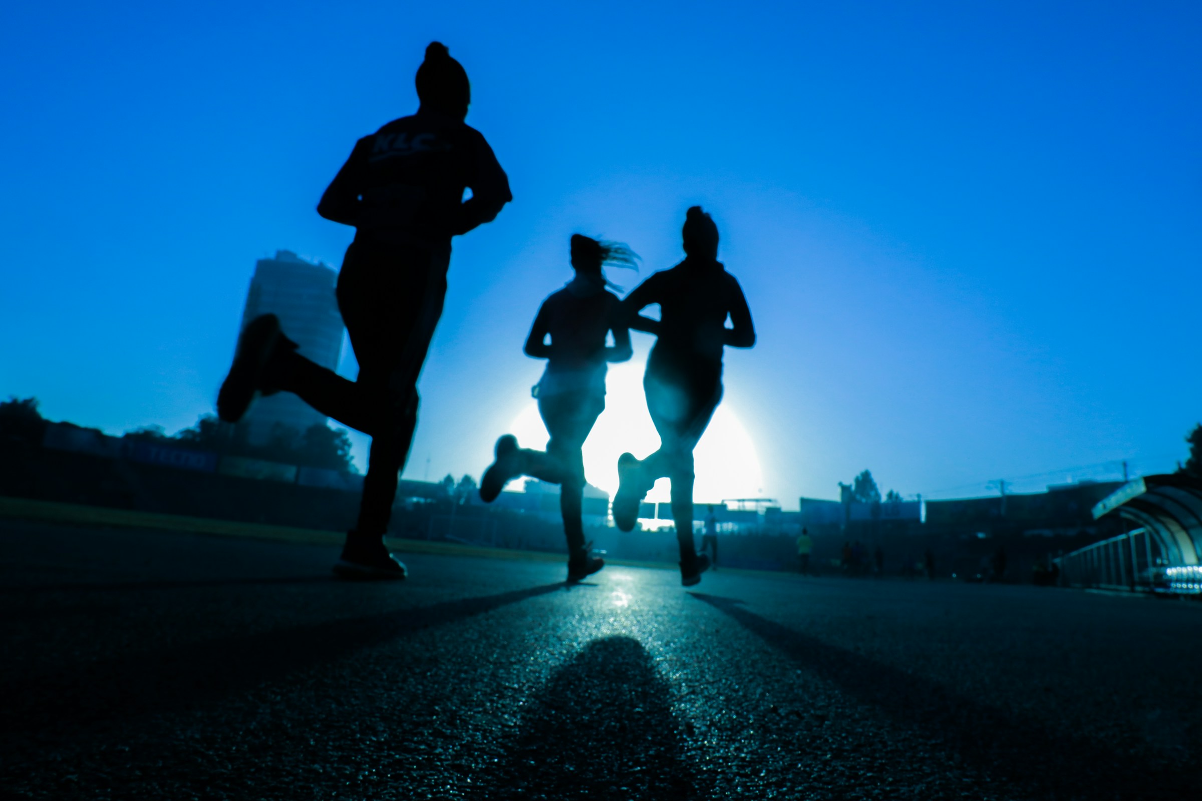 Athletes on a night track
